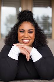 Profile picture of Angie Thomas, children's author.
