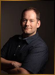 Profile picture of Brandon Mull, children's author.