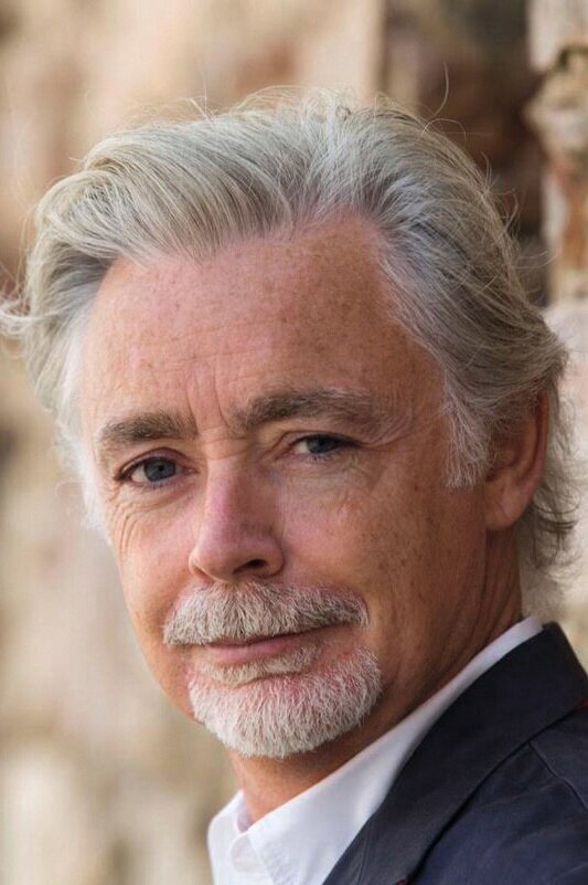 Profile picture of Eoin Colfer, children's author.