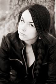 Profile picture of Tess Sharpe, children's author.